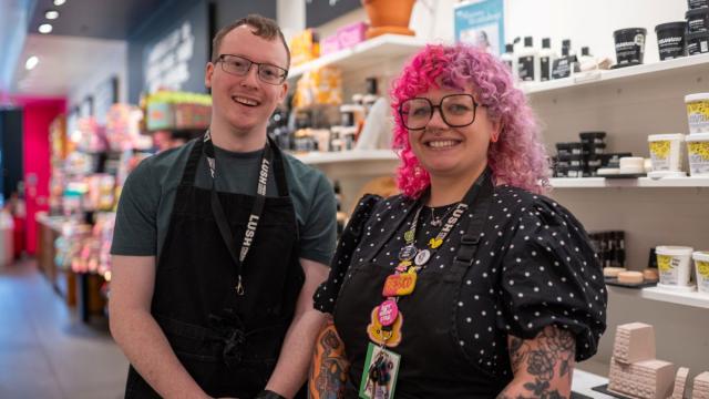 Gary and Besco smiling in the Lush shop