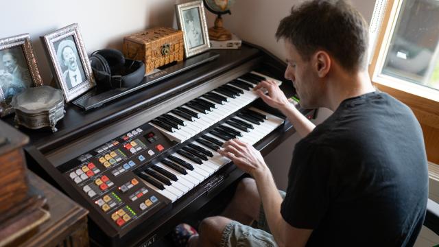 Tom playing his piano in Honiton