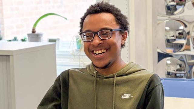 Terence smiling after receiving his glasses